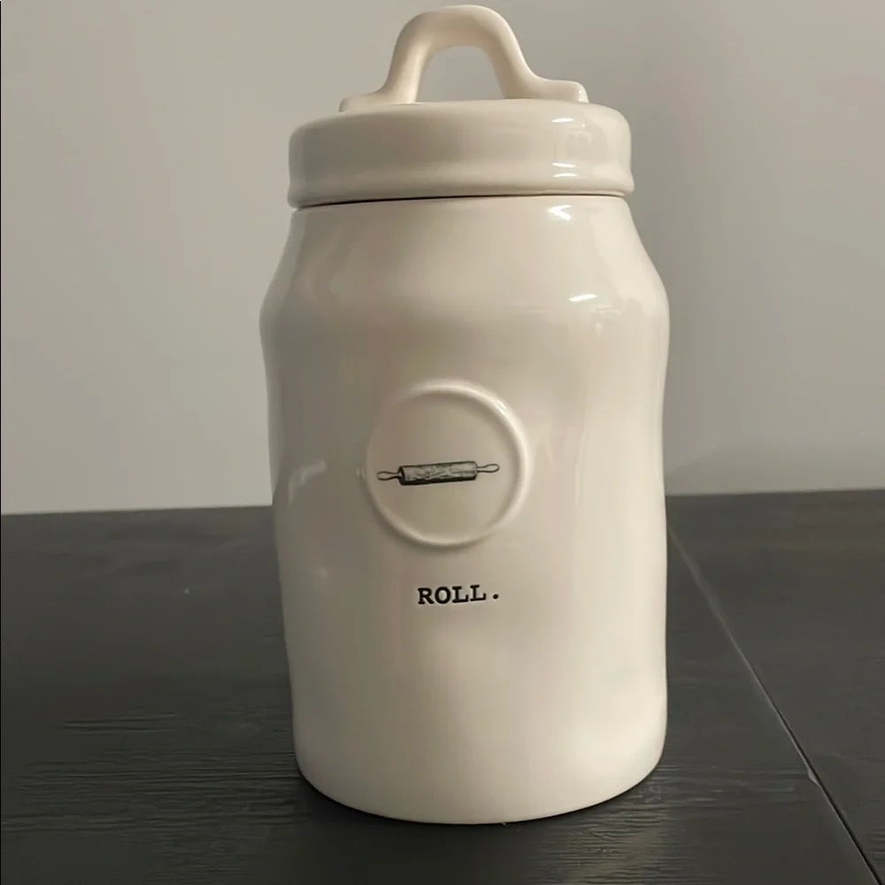 White Ceramic Kitchen Canister with Rolling Pin Design